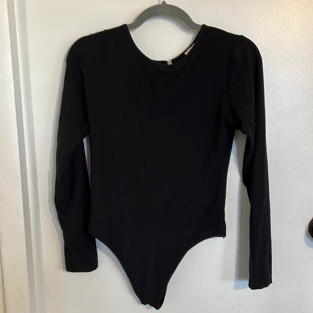 Black open back bodysuit. NWT.